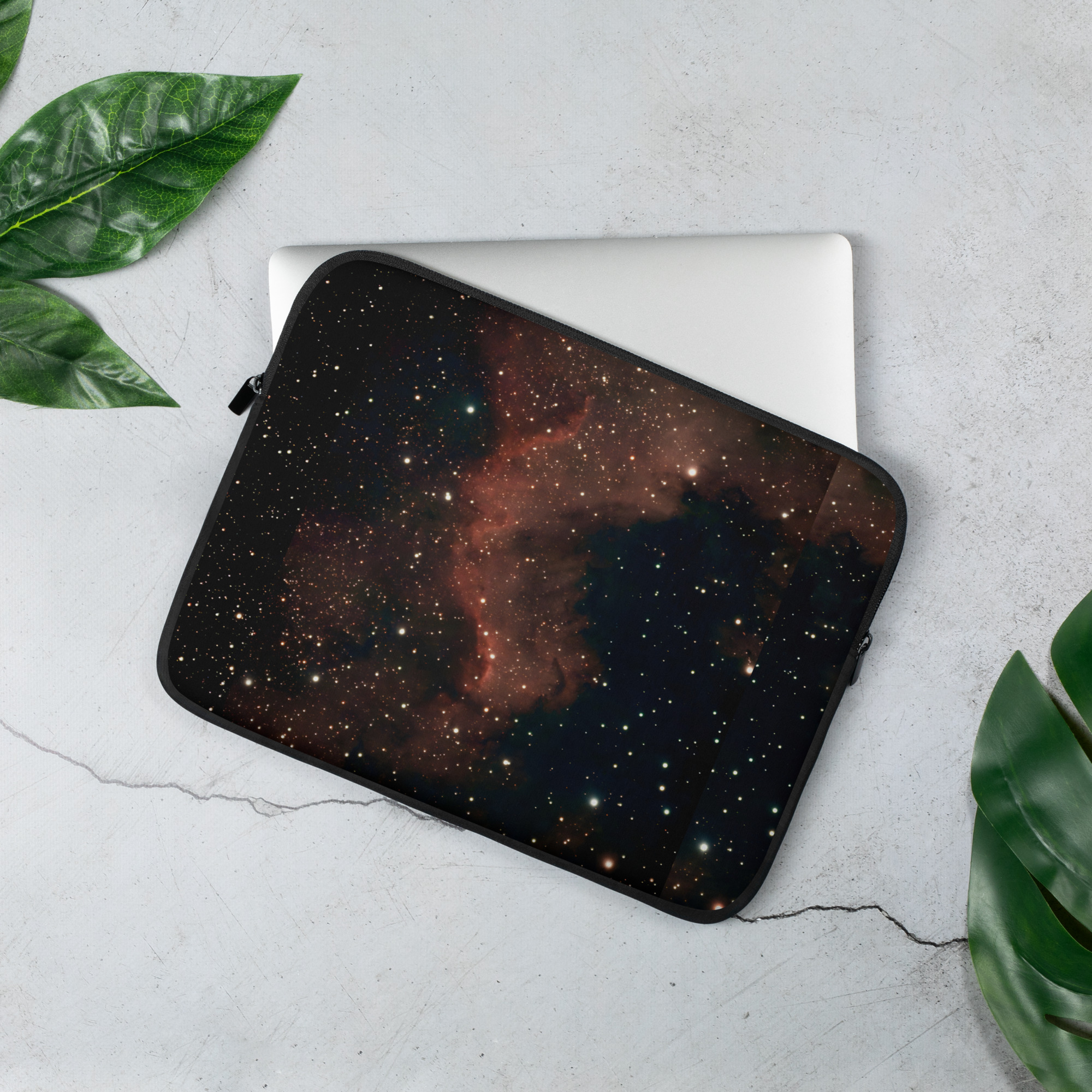 Laptop sleeve featuring the North America Nebula (NGC 7000) — a striking red and gold emission nebula in the constellation Cygnus, photographed from the night skies of Tallinn, Estonia